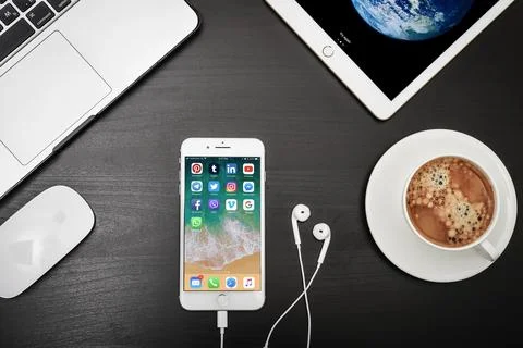Apple iPhone 8 plus with social network apps on the screen Stock Photos