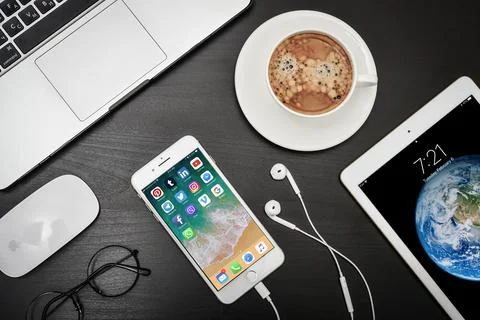 Apple iPhone 8 plus with social network apps on the screen Stock Photos