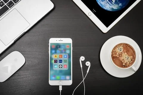 Apple iPhone 8 plus with travel apps on the screen Stock Photos