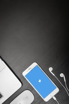 Apple iPhone 8 plus with Twitter app on the screen Stock Photos