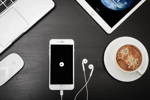 Apple iPhone 8 plus with Uber apps on the screen Stock Photos