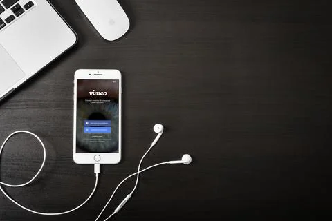 Apple iPhone 8 plus with Vimeo app on the screen Stock Photos