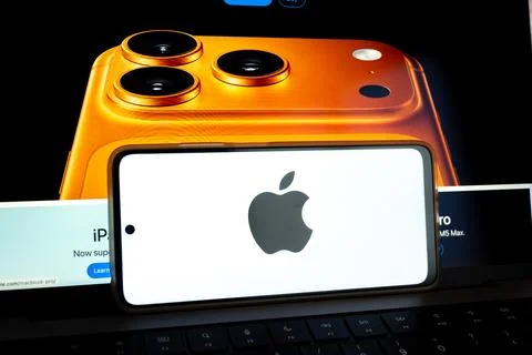 Apple iphone branding on smartphone with technology background Stock Photos