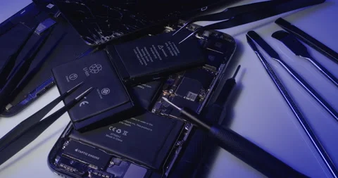 Apple iPhone components, replacing damaged parts, display and battery repair Stock Footage 237387009