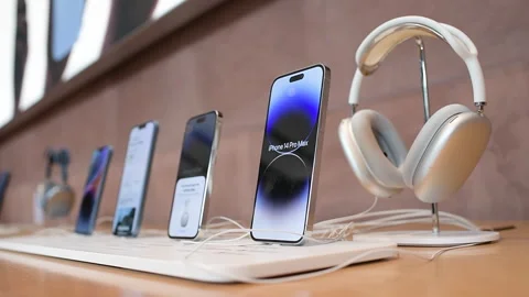 Apple iPhone Current Range with AirPods Max - Apple Store Interior Stock Footage 263973383