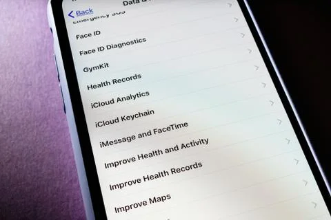 Apple iPhone XS with data and privacy on multiple Apple Services and apps Stock Photos