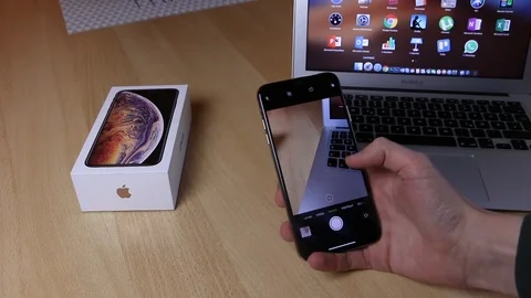 Apple iPhone Xs Max Gold Using the camera Shot Stock Footage 102378865