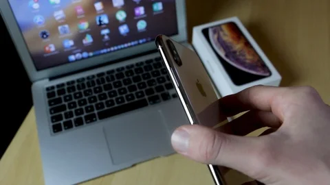 Apple iPhone Xs Max Gold Design shot 2 Stock Footage 102378870