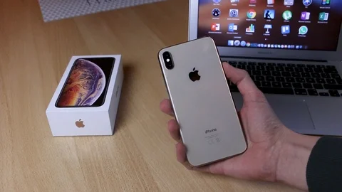 Apple iPhone Xs Max Gold Shiny design shot Stock Footage 102378874