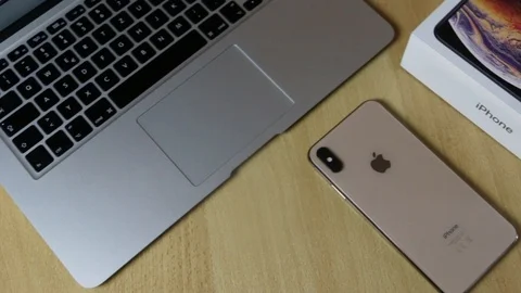 Apple iPhone Xs Max Gold Smartphone design shot Stock Footage 102378876