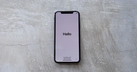 Apple iPhone XS Space Gray First Starting Welcome Screen on Multi Language Stock Footage 107220236