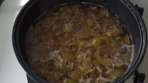 Apple jam boiling in a pan. Stock Footage 243507691