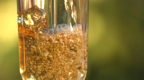 Apple juice on the background of growing apples. Stock Footage 67323447