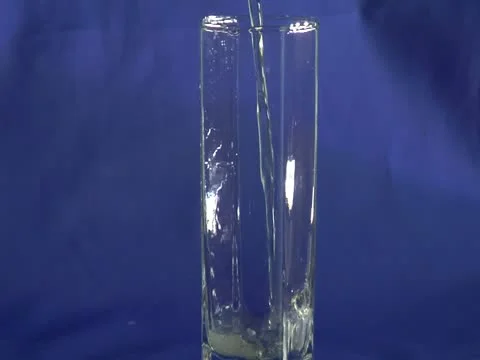 Apple juice flows in glass Stock Footage 22151330
