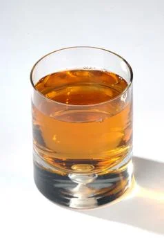 Apple juice on a light background Stock Photos