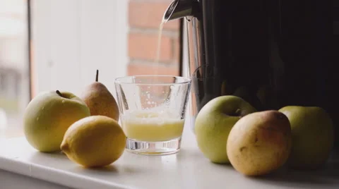 Apple Juice Squeezed Into Cup Stock Footage 47874497