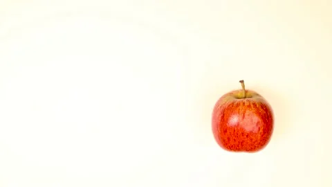Apple jumping on white background. Stock Footage 136468464