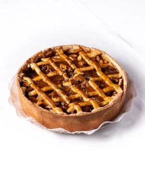 Apple kuchen on white table Fotos de archivo