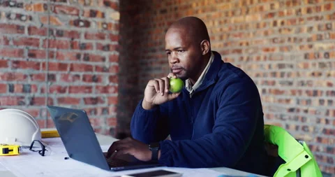 Apple, laptop and thinking with black man on construction site for planning or Stock Footage 336778803