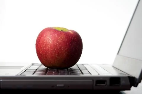Apple on a laptop Stock Photos