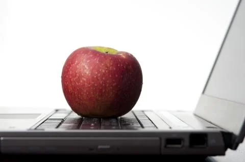 Apple On A Laptop Stock Photos