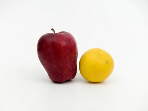Apple &amp; Lemon White Background Close Up Stock Photos
