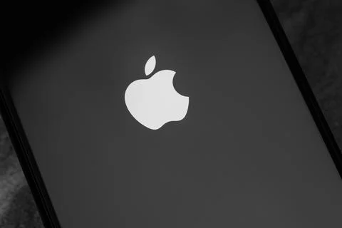 Apple Logo On Dark Gradient Background: Minimal Tech Brand Symbol For Moder.. Stock Photos