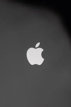 Apple Logo On Dark Gradient Background: Minimal Tech Brand Symbol For Moder.. Stock Photos