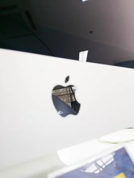 Apple logo on iMac isolated over white Stock Photos