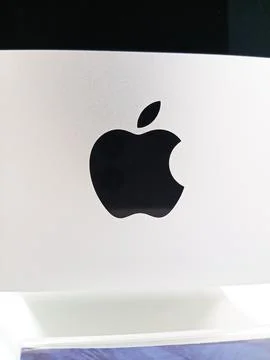 Apple logo on iMac isolated over white Stock Photos