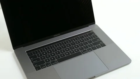 Apple MacBook Pro 15 inch laptop. Pan down to keyboard. Stock Footage 237750956