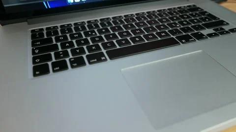 Apple MacBook Pro backlit keyboard, slide right. Close up. Stock Footage 237751445