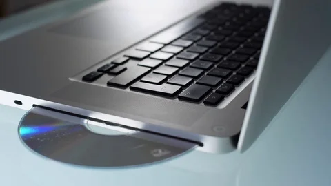 Apple Macbook Pro Laptop ejecting disc Stock Footage 72212041