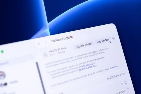 Apple macOS 27 beta software update interface displayed on a computer screen, Stock Photos