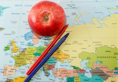 Apple on the map Stock Photos