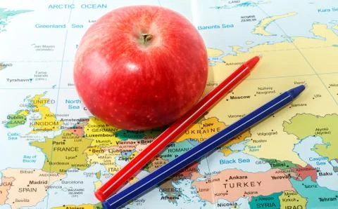 Apple on the map Stock Photos