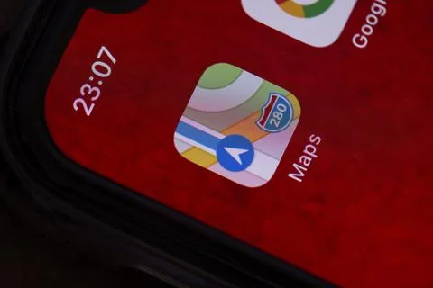 Apple Maps mobile application on smartphone screen Stock Photos