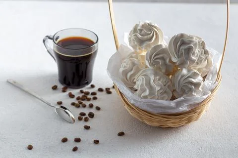 Apple marshmallows on a light background in a plate, in the background is a c Stock Photos