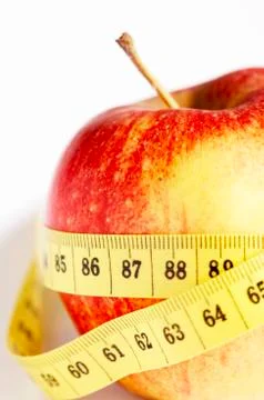 Apple with measuring tape 库存照片