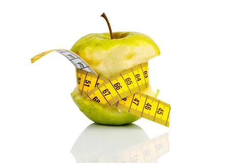Apple with measuring tape on Stock Photos