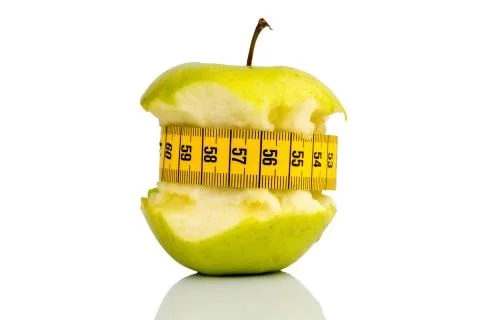 Apple with measuring tape on Stock Photos