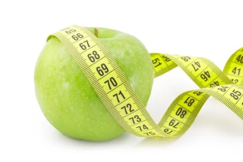 Apple with measuring tape Stock Photos