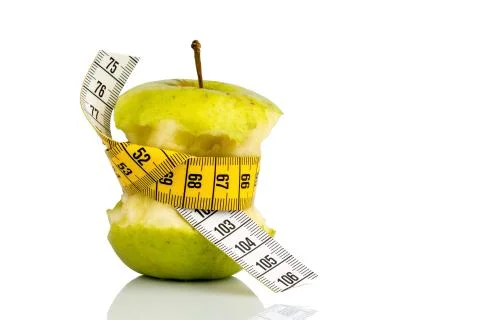Apple with measuring tape on Stock Photos