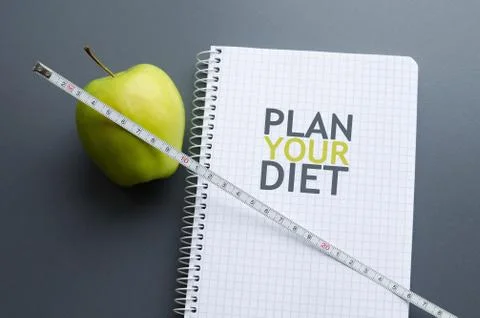 Apple with measuring tape, plan your diet concept Stock Photos