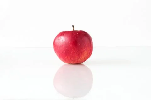 Apple mirroring on white background Stock Photos
