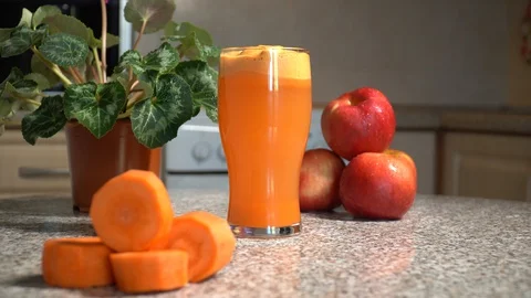 Apple mix juice on the table Stock Footage 128518074