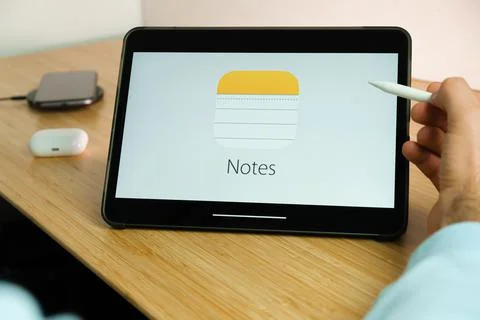 Apple Notes logo on the screen of iPad tablet. March 2021, San Francisco, USA Stock Photos
