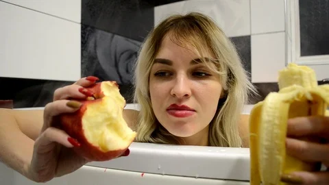 Apple or banana in bath Stock Footage 101552743