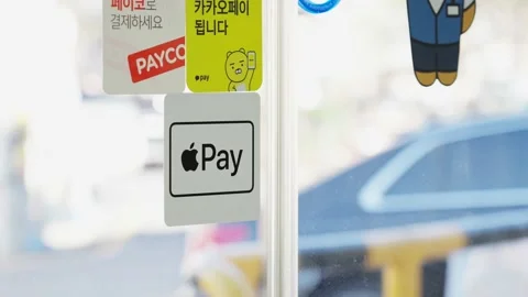 Apple Pay available soon and Apple Pay service sticker at South Korea 스톡 동영상 235647816