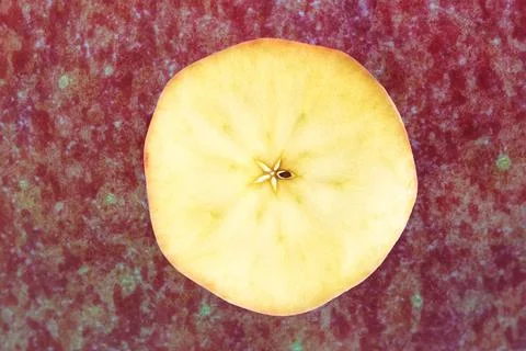 Apple with peel in background Stock Photos